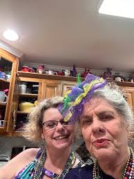 The Ladybugs of Red Hat Society had their Mardi Gras party. So much  laughter and good food.