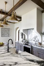 Black And White Marble Kitchen Countertops Beautiful Kitchen Features Gray Wash Cabinets Paired With Dark Gray And White Marble Cou Kitchen Inspiration Design White Marble Countertops Beautiful Kitchens