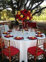 Autumn bridal bouquet in yellow, orange and red featuring. Rose Rose And Sunflowers Red Wedding Decorations Sunflower Wedding Red Roses Centerpieces