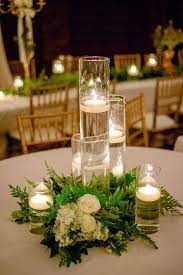 Erica And Josh S Wedding In Nashville Tennessee Greenery Wedding Centerpieces Affordable Wedding Centerpieces Wedding Candles Table