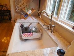 My neighbor came over to our house last night because one of their water lines rupture and they needed assistance. Menards Tuscany Farmhouse Sink