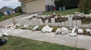 Building a stone wall rock retaining wall stone fence stone walkways stone masonry garden types dry stone rock wall garden structures. An Austin Chopped Stone Retaining Classic Rock Stone Yard ÙÙŠØ³Ø¨ÙˆÙƒ