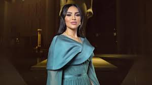 Elisa as Cinderella and Adam behaving humanely at the Qatar Ball