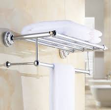 This unique towel holder is a must for your bathroom. 2016 Luxury Chrome Design Towel Rack Modern Bathroom Accessories Towel Bars Shelf Ceramic Base Towel Holder Toalheiros Affiliate Towels Modern Bathroom Accessories Towel Holder Bathroom Bathroom Accessories