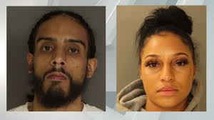 Man wanted, woman charged after Lancaster drug raid