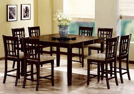 Table made of pine wood, veneers and engineered wood. Rich Cappuccino Finish Counter Height Lazy Susan 9 Piece Dining Set By Coaster 101898