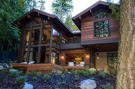 Browse a variety of modern rustic house plans online! Striking Lake House Blends Modern Elements With Traditional Montana Style House Designs Exterior Lake Houses Exterior Modern Lake House