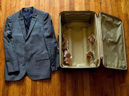 The Wrinkle Proof Method For Packing A Suit Travel Outfit Wrinkle Free Packing Free Clothes