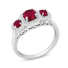 ruby and 1 5 ct t w diamond vintage style three stone engagement ring in 14k white gold