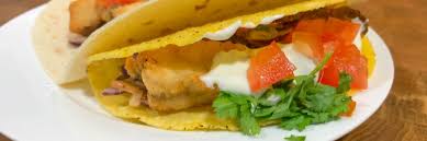 This place has a banner that says hawaii's best fish tacos across the top. Tasty Beer Battered Fish Tacos