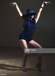Beautiful Female Dancer Dancing Wearing Hat And High Heels Female Dancer Woman Dancing Photography Women Dancing