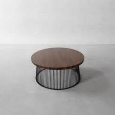 We can add hydraulic legs to desks and our Seattle Coffee Table