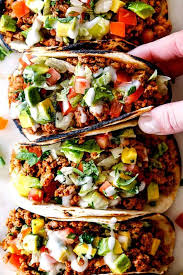 Up Close Top View Of A Row Of Easy Turkey Taco With Ground Turkey Taco Seasoning Lettuce Sour Cream To Turkey Tacos Lunch Recipes Healthy Easy Turkey Tacos