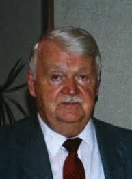 Ranald Woolley Obituary