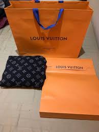 She paired the look with a leopard purse and studded sneakers. Louis Vuitton Lv Sweater Luxury Apparel On Carousell