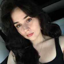 Lost black dog with white spots in Tulsa