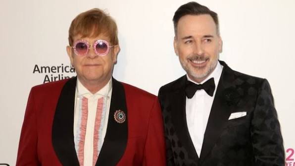 How Elton John's husband, David Furnish, runs the rock star's music empire