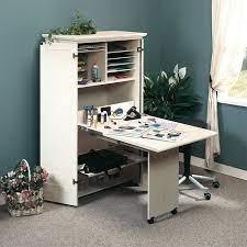 Then your sewing machine and other materials might simply be on your dining table until you're done with your project. Sauder Harbor View Craft Armoire Antiqued White Finish Walmart Com Walmart Com