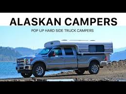 2000 sunlite pop up truck camper has stool/shower combo with sink, storage cabinets, kitchen sink, frig, stove, dining table (stores under couch), couch (pulls out to sleep two), storage under table area, queen sleeper above. Pop Up Hard Side Truck Campers By Alaskan Campers Youtube