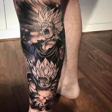 Black small tribal shape dragon tattoo design on shoulder of a men looking awesome. Dragon Ball Z Tattoo Ideas Wiki Tattoo