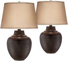 This charming and rustic tractor table lamp will meet your country style needs while adding the practicality of providing a great source of light. Buy Brighton Rustic Table Lamps Set Of 2 Hammered Bronze Metal Pot Beige Linen Drum Shade For Living Room Family Bedroom Bedside Barnes And Ivy Online In Turkey B077twt89g