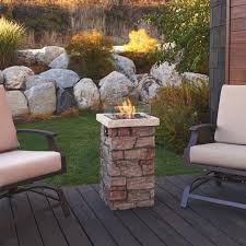 Has a circular design of natural fitted stones with a gray slate top. The Best Fire Columns Outdoor Fire Pit Alternative Apartment Therapy