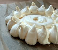 Spread the meringue on top of your circle on the baking paper, making the sides. Custard Powder Pavlova Butcher Baker Baby