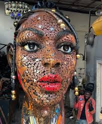 6 foot woman mixed media sculpture