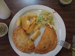 Lighly flour surface and roll out dough to 1/4 inch thick (or to desired thickness). Empanadas Chicken And Beef With Fried Yucca Dipping Sauce To The Side And Salad Picture Of Empanadas More Valdosta Tripadvisor