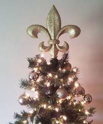 Double sided black and gold glitter fleur de lis ornament ready to hang with gold ribbon loop at top measures 325 inches x 275 inches measured without top loop need gift wrap available at extra cost paid at checkout perfect decoration for new orleans or saints parties. Fleur De Lis Topper Fleurdelisontop On Pinterest