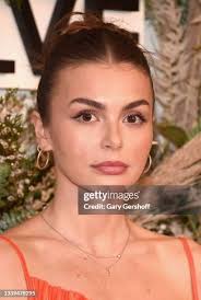 Barbara Pavlin and Dylan Sprouse attend the inaugural REVOLVE GALLERY...  News Photo