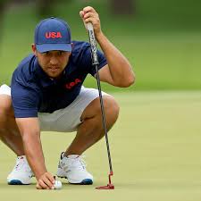 When the last group walked onto the 18th green, nine players remained in the mix for a medal. I8sh2zkvjxortm