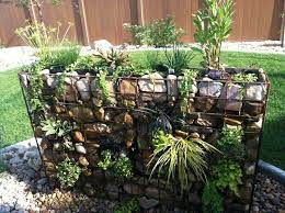 Practical Ways To Use Gabions The Owner Builder Network Gabion Garden Gabion Wall Garden Design