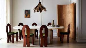Room & board set of 4 walnut chairs and one bench. A Stirring Design Showpiece That S Both New And Unusual Architectural Digest