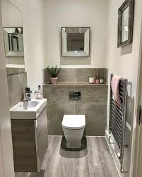 These bathroom decor ideas range from the quirky to the glamorous. So The Grey And Pink Theme Starts Right Here Downstairs Loo Delight And It Really Is A Del Toilet Room Decor Small Downstairs Toilet Small Toilet Room