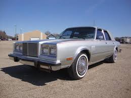 Image result for Radiant Silver 1985 Chrysler