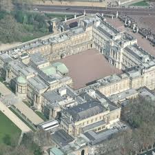 An aerial view of the palace of westminster with hyde park, st james' park and buckingham palace visible in the distance. Buckingham Palace In London United Kingdom 2 Virtual Globetrotting