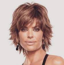 The hairstyle tends to speak out of the celeb's bold and confident persona. Lisa Rinna Goes Bald Snarks Brandi Glanville Over Wig Accusation Medium Hair Styles Thick Hair Styles Short Shag Hairstyles