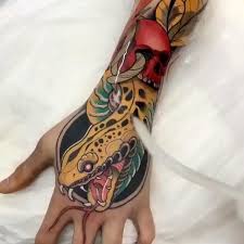 Neo Traditional Viper Hand Tattoo By Mares Tattooist Snake Tattoo Design Tattoo Design For Hand Traditional Snake Tattoo