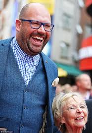 Tom Davis towers over Bad Education co-star Sheila Reid at London premiere 