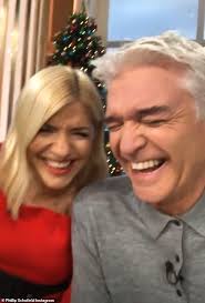 Phillip Schofield plants a kiss