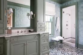 Dark grey is similar to black so it is usually combined with the same colors when interior remodeling. Gray Washstand With Dark Gray Herringbone Floor Tiles Transitional Bathroom