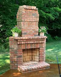 Outdoor fireplace brick red fireplaces huntsville stone. Out Door Brick Fireplaces Are My Specialty Outdoor Fireplace Patio Outdoor Fireplace Brick Backyard Fireplace