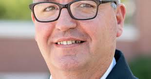 Trimmer promoted to 911 communications director