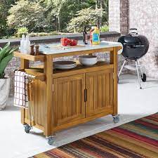 Financing available, free shipping on most orders. Homestyles Maho Golden Brown Teak Outdoor Barbeque Cart Serving Bar 5663 95 The Home Depot