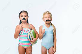 Check spelling or type a new query. Cute Little Girls In Swimsuits Holding Books And Party Sticks Stock Photo Picture And Royalty Free Image Image 102325205