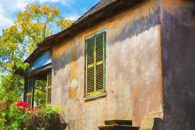Stucco construction often looks impressive, and is durable, cheap, and relatively easy to apply. Green Shutters Stucco Walls St Augustine 003 Photograph By Rich Franco