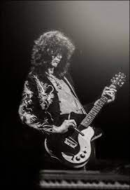 Jimmy Page Of Led Zeppelin Performing On Stage At Earls Court Jimmy Page Led Zeppelin Zeppelin