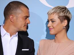 They shared a black and white image of the firework singer and english actor holding onto the newborn's hand. Katy Perry Outbids Fan To Win Date With Own Boyfriend Orlando Bloom