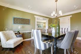 Light Olive Dining Room Features A Black Dining Table With Carved Stock Photo Picture And Royalty Free Image Image 93929146